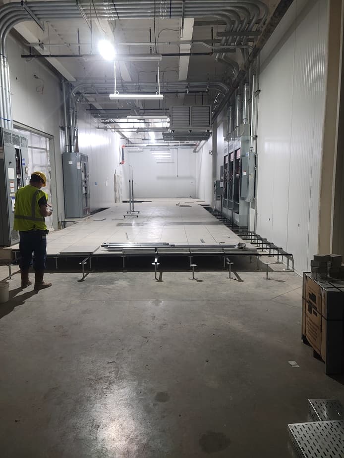 Comp-Utility raised access flooring installed in a large EV and battery production lab